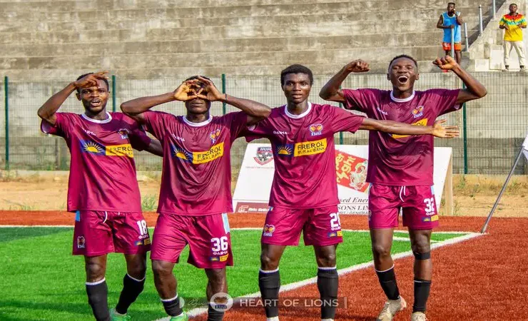 heart of lions players celebrating