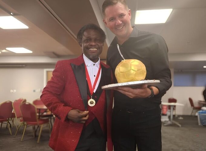 Ghanaian Scout Theophilus Nii Ankamah Densu (left) with his medal
