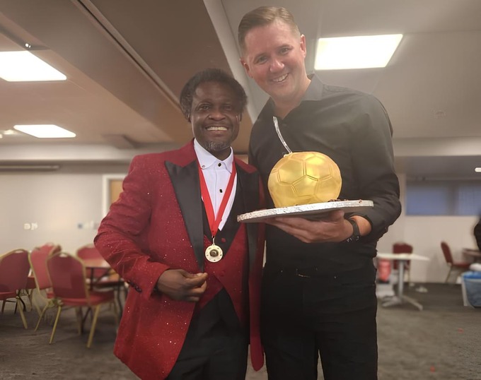 Ghanaian Scout Theophilus Nii Ankamah Densu (left) with his medal